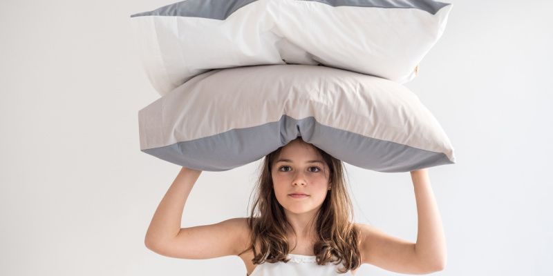 Dormir sans oreiller : les arguments pour et contre