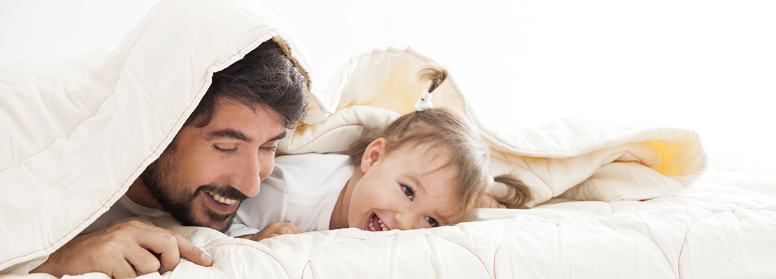 homme et enfant avec un duvet de Zizzz